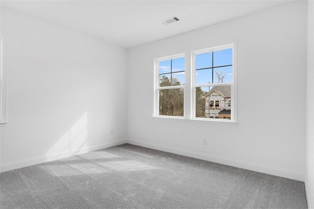 view of carpeted spare room