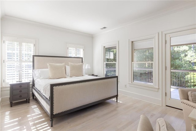 bedroom with crown molding, access to outside, baseboards, visible vents, and light wood-style flooring