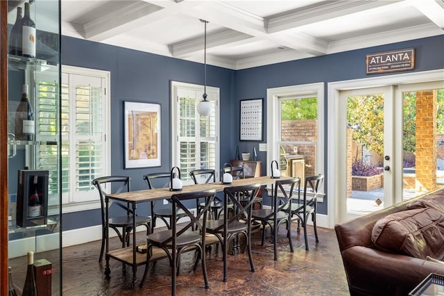dining area with baseboards, coffered ceiling, crown molding, and beam ceiling