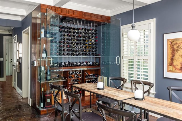 wine room with ornamental molding