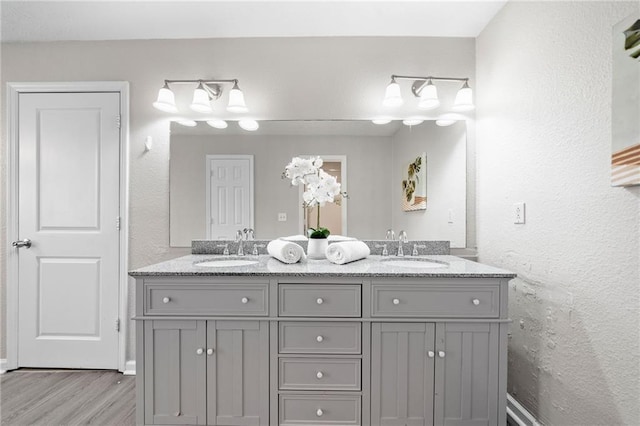 705 Beaufort Cir, Duluth, GA 30096 - full bathroom with wood finished floors and double vanity