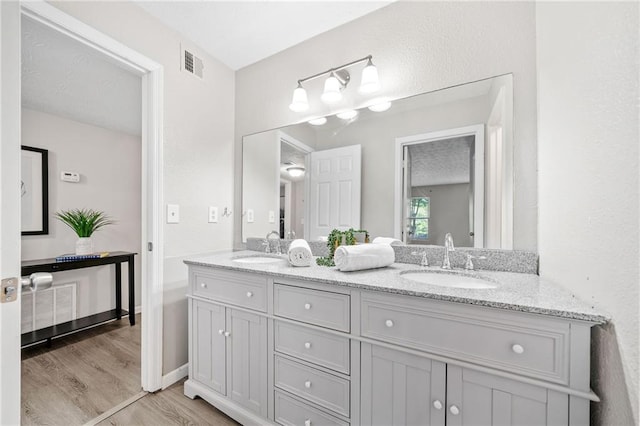 705 Beaufort Cir, Duluth, GA 30096 - full bath with wood finished floors and double vanity