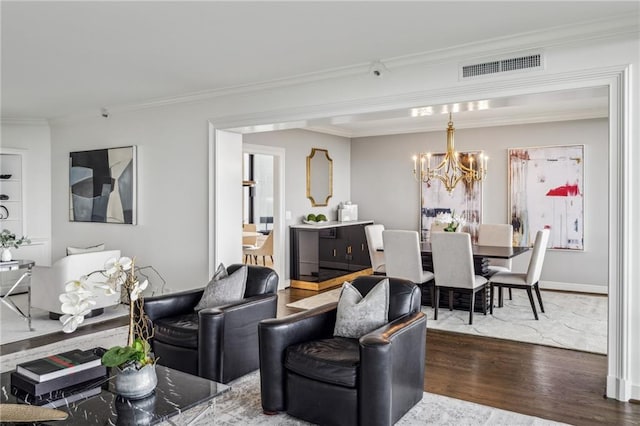 2660 Peachtree Rd NW Unit 23A, Atlanta, GA 30305 - living area with ornamental molding, wood finished floors, and a chandelier
