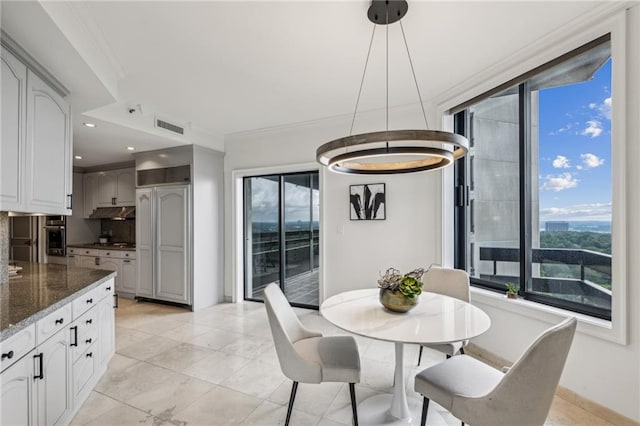2660 Peachtree Rd NW Unit 23A, Atlanta, GA 30305 - dining room featuring ornamental molding, light tile patterned floors, and recessed lighting