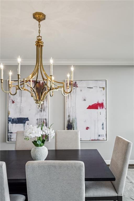 2660 Peachtree Rd NW Unit 23A, Atlanta, GA 30305 - dining room with a chandelier and ornamental molding