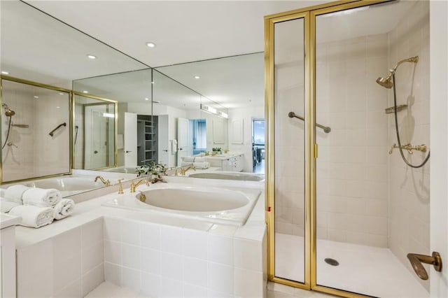 2660 Peachtree Rd NW Unit 23A, Atlanta, GA 30305 - full bath with a shower stall, vanity, a garden tub, and recessed lighting