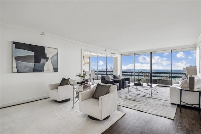 2660 Peachtree Rd NW Unit 23A, Atlanta, GA 30305 - living area featuring ornamental molding, wood finished floors, and a wall of windows
