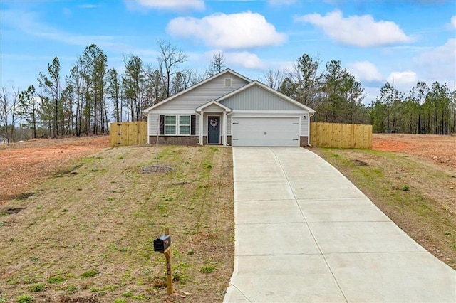 view of front facade featuring a garage and a front yard