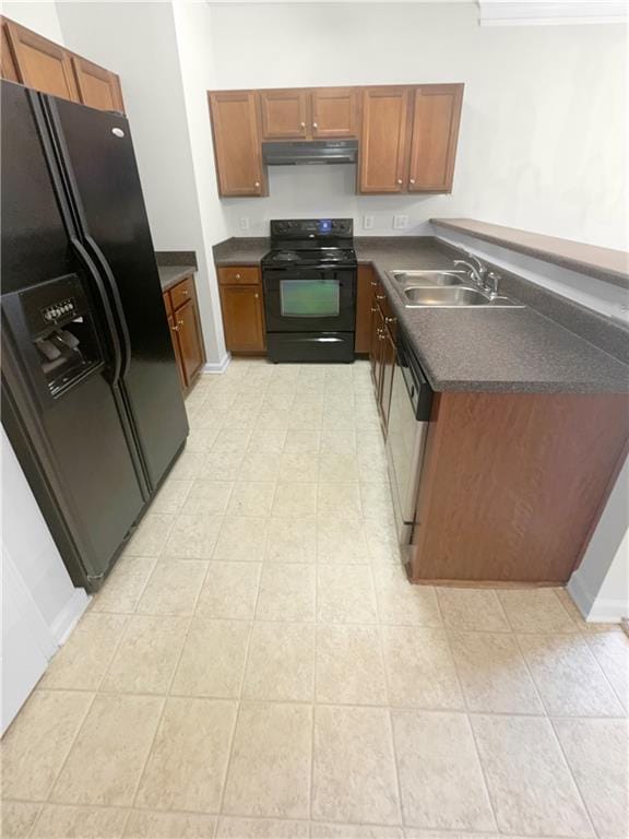 kitchen featuring black appliances and sink