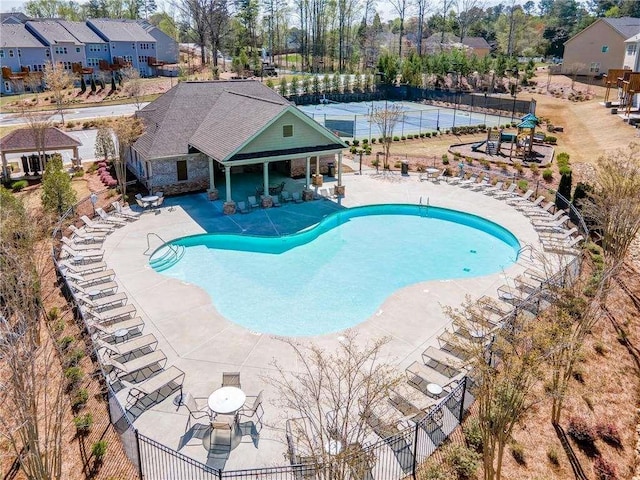 view of swimming pool featuring a patio