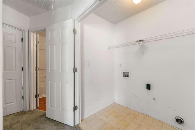 clothes washing area with washer hookup, gas dryer hookup, light carpet, and electric dryer hookup