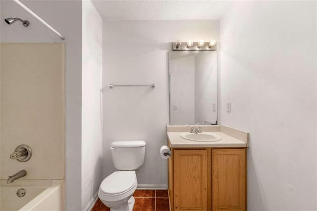 full bathroom featuring vanity, a textured ceiling, shower / bathing tub combination, toilet, and tile patterned floors