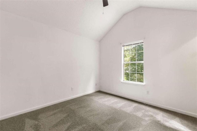 interior space with ceiling fan and vaulted ceiling