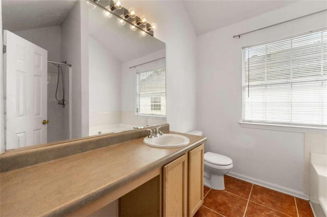 full bathroom with vaulted ceiling, toilet, and a wealth of natural light