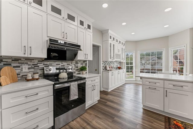 479 Rising Sun Path, Lawrenceville, GA 30043 - kitchen featuring stainless steel range with electric cooktop, light countertops, backsplash, recessed lighting, and range hood