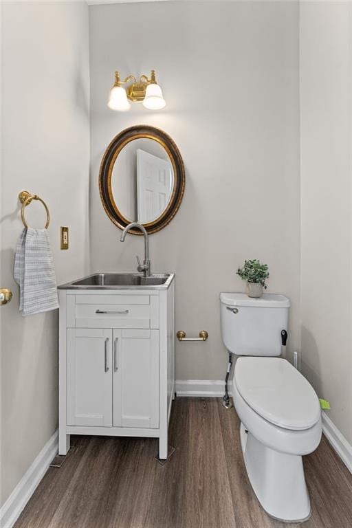 479 Rising Sun Path, Lawrenceville, GA 30043 - half bathroom featuring wood finished floors and vanity