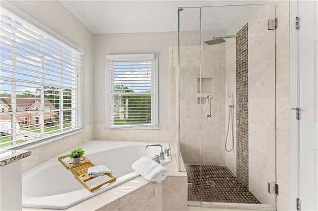 479 Rising Sun Path, Lawrenceville, GA 30043 - bathroom featuring a garden tub and a stall shower