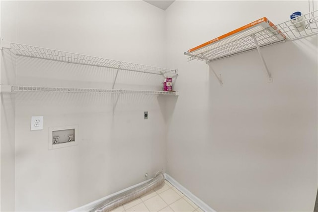 479 Rising Sun Path, Lawrenceville, GA 30043 - laundry room featuring hookup for an electric dryer, washer hookup, and light tile patterned floors