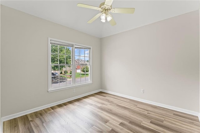 479 Rising Sun Path, Lawrenceville, GA 30043 - empty room featuring light wood-type flooring and ceiling fan