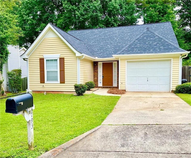3793 Mays Ct SW, Atlanta, GA 30331 - view of front of home featuring a shingled roof, a garage, and driveway