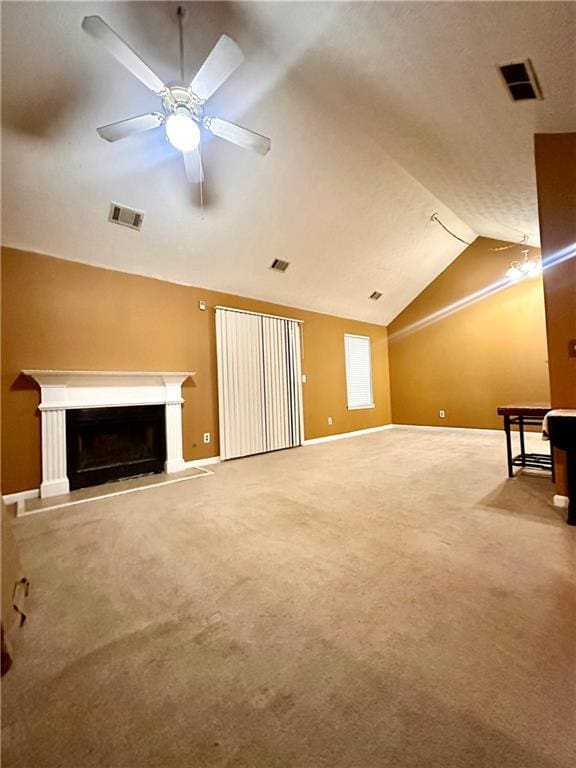 3793 Mays Ct SW, Atlanta, GA 30331 - unfurnished living room featuring lofted ceiling, a fireplace with raised hearth, carpet flooring, ceiling fan, and baseboards