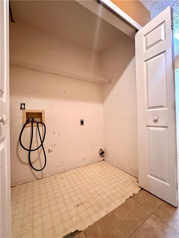 3793 Mays Ct SW, Atlanta, GA 30331 - laundry room featuring hookup for a washing machine, hookup for an electric dryer, and baseboards