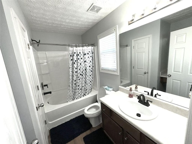532 Oakside Pl, Acworth, GA 30102 - full bath featuring vanity, toilet, shower / bath combo, wood finished floors, and a textured ceiling