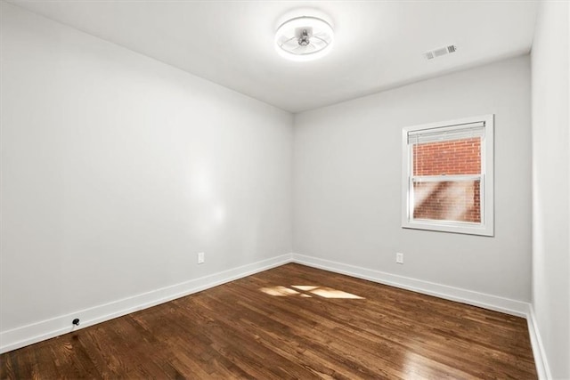 empty room featuring hardwood / wood-style floors