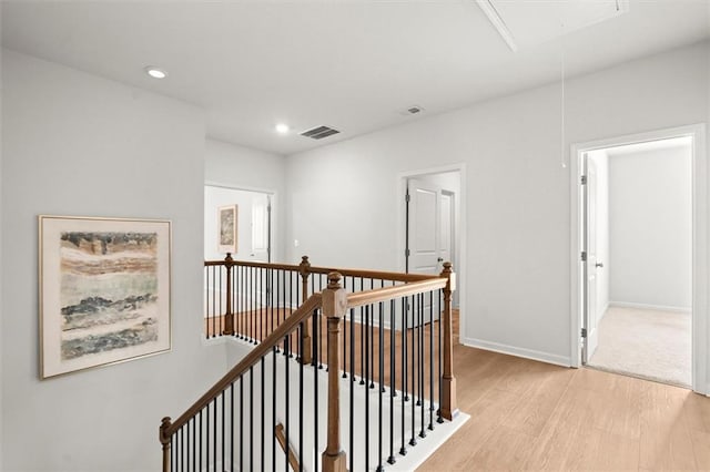 7410 Ansley View Ln, Cumming, GA 30028 - corridor featuring attic access, an upstairs landing, light wood-type flooring, and recessed lighting