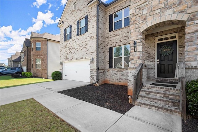 7410 Ansley View Ln, Cumming, GA 30028 - view of front of house with an attached garage and concrete driveway