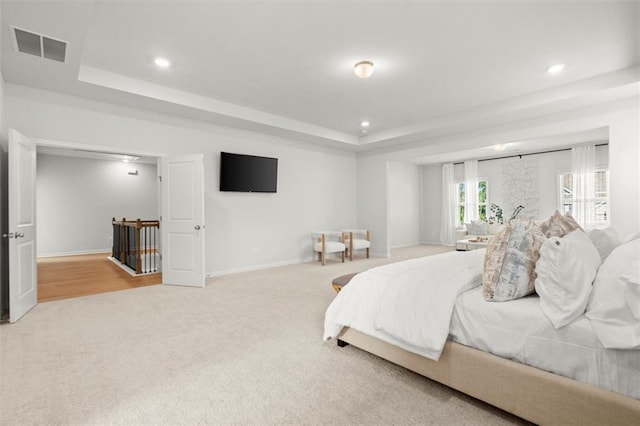 7410 Ansley View Ln, Cumming, GA 30028 - carpeted bedroom featuring a raised ceiling and recessed lighting