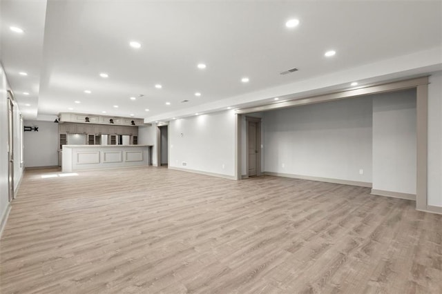 7410 Ansley View Ln, Cumming, GA 30028 - unfurnished living room featuring recessed lighting and light wood finished floors