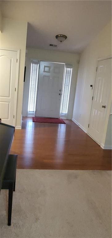 999 Simonton Glen Dr, Lawrenceville, GA 30045 - entrance foyer with wood finished floors and baseboards