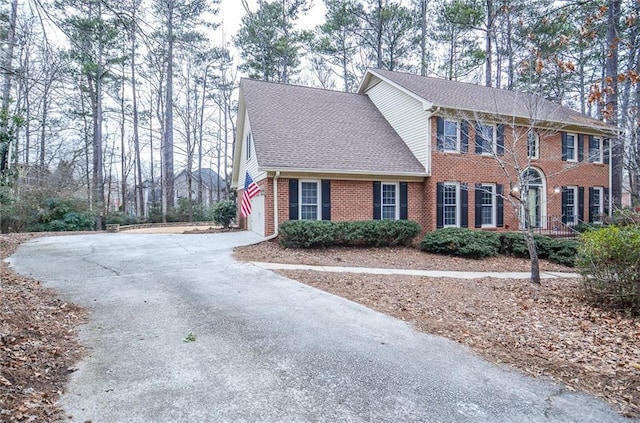 colonial-style house with a garage