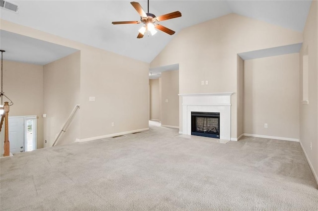 unfurnished living room with light carpet, high vaulted ceiling, and ceiling fan