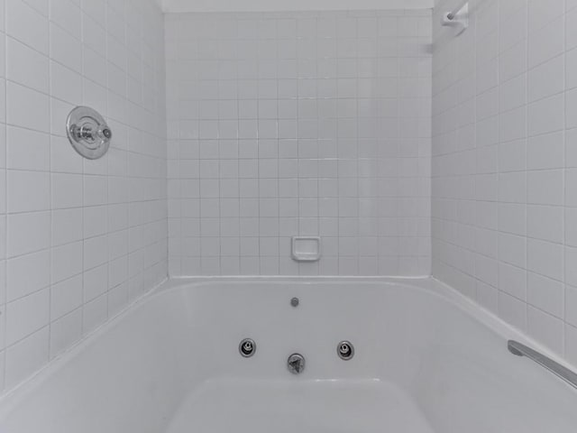 bathroom with shower with separate bathtub