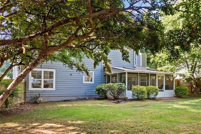 5552 Knox Pl, Peachtree Corners, GA 30092 - rear view of house featuring a sunroom