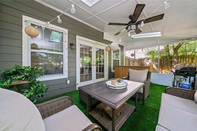 5552 Knox Pl, Peachtree Corners, GA 30092 - sunroom with french doors, ceiling fan, and a skylight
