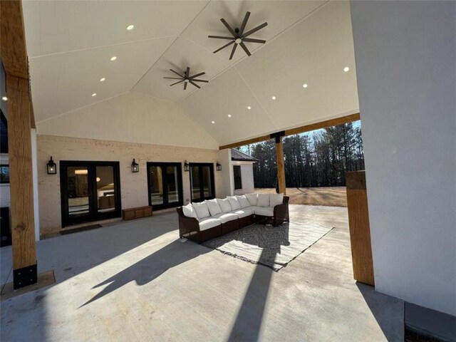 view of patio / terrace featuring ceiling fan and an outdoor living space