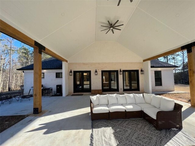 view of patio with an outdoor hangout area and a ceiling fan