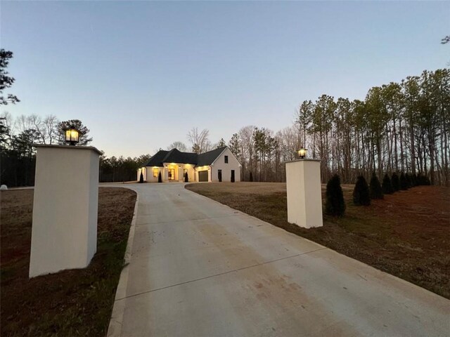 view of road with driveway