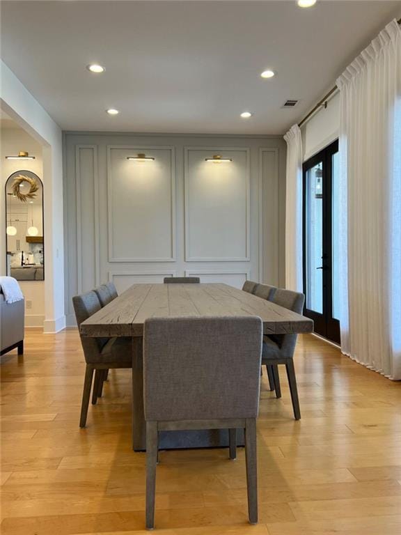 613 Bill Rutledge Rd, Winder, GA 30680 - dining room with recessed lighting, light wood-style floors, and a decorative wall