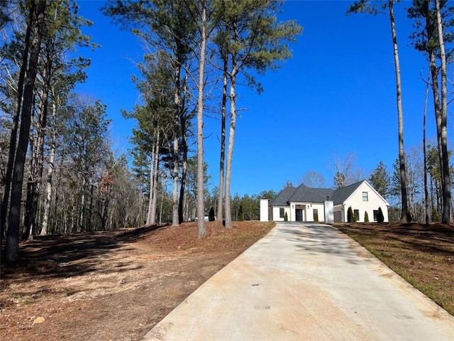 view of front of house featuring concrete driveway