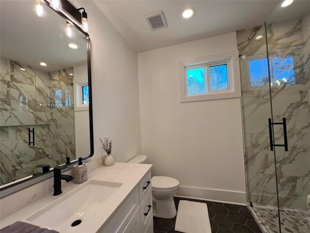 613 Bill Rutledge Rd, Winder, GA 30680 - bathroom with vanity, a marble finish shower, tile patterned floors, and recessed lighting