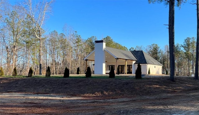 view of front of property with a chimney