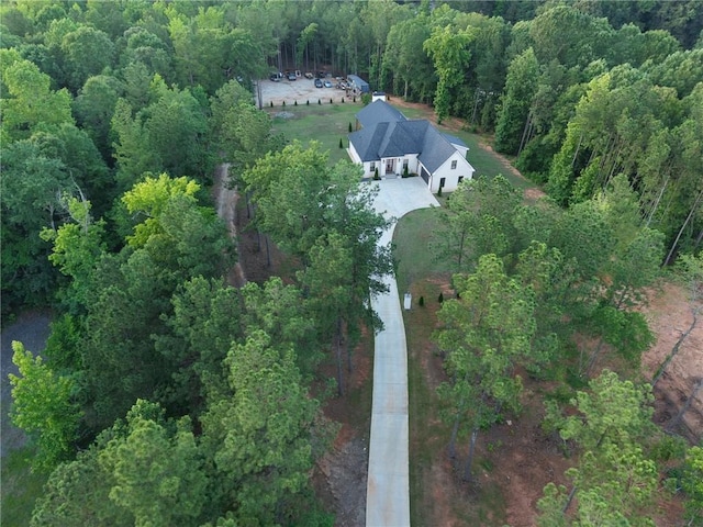 613 Bill Rutledge Rd, Winder, GA 30680 - aerial view of property and surrounding area with a heavily wooded area
