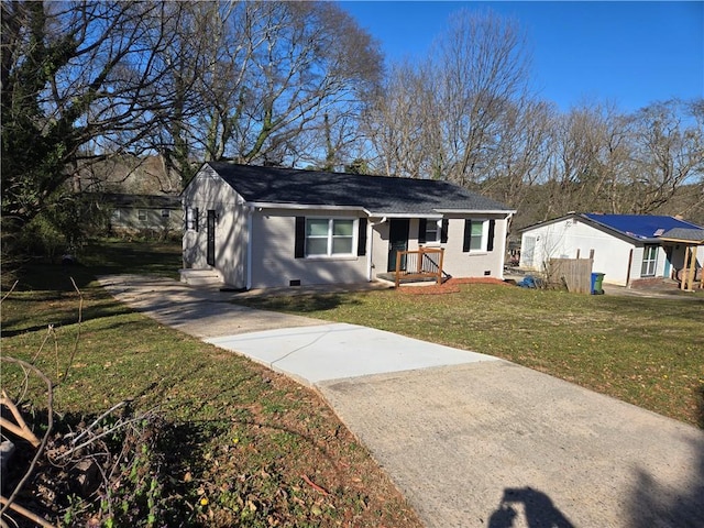 view of front of house with crawl space, brick siding, and a front lawn