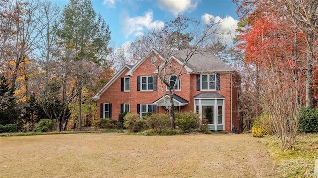 view of front of house with a front lawn