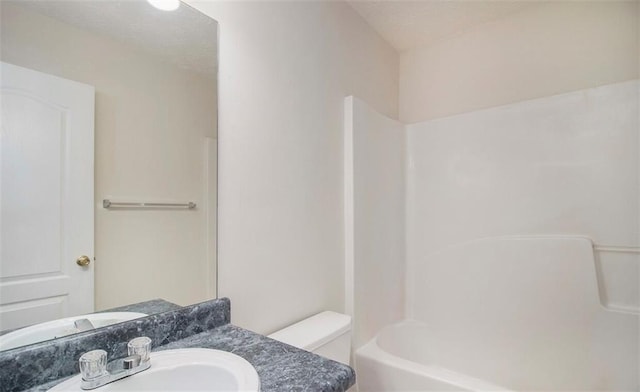 2960 Fields Dr, Lithonia, GA 30038 - full bathroom with vanity, washtub / shower combination, and toilet