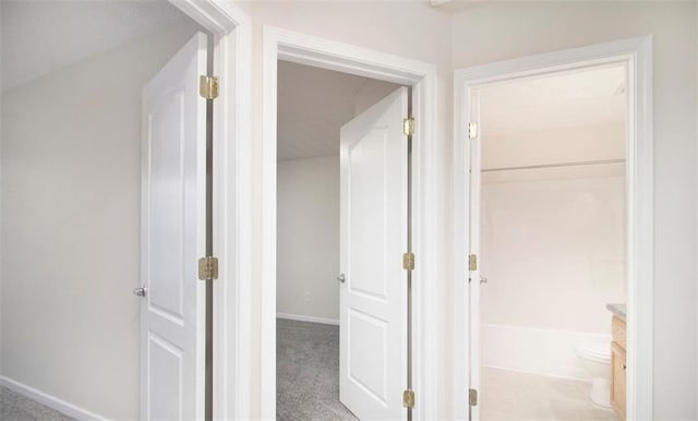2960 Fields Dr, Lithonia, GA 30038 - hallway featuring baseboards